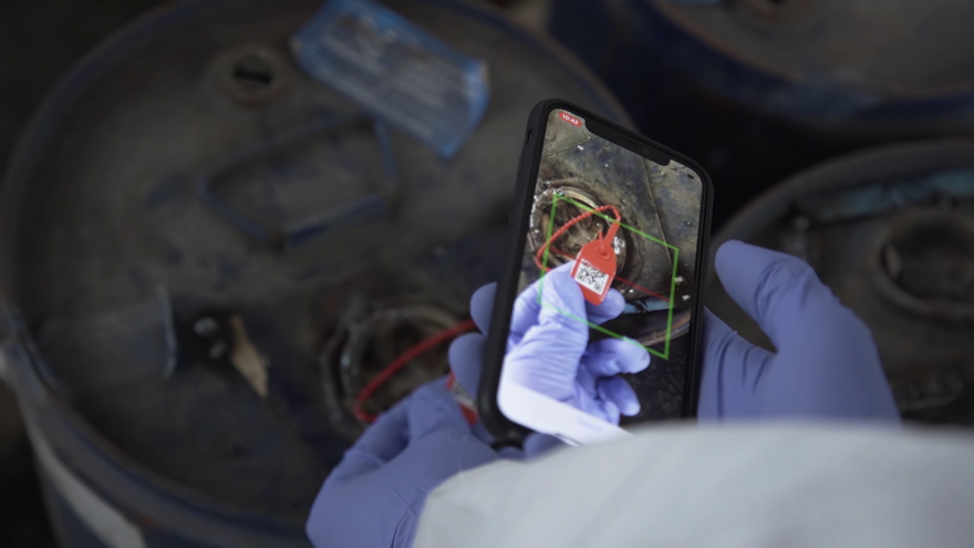 image of ev battery technician Scanning Raw Materials